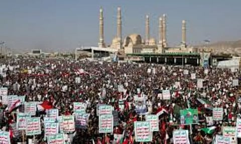 Supporters of the Houthi movement rally to denounce air strikes launched by the U.S. and Britain on Houthi targets (Reuters)