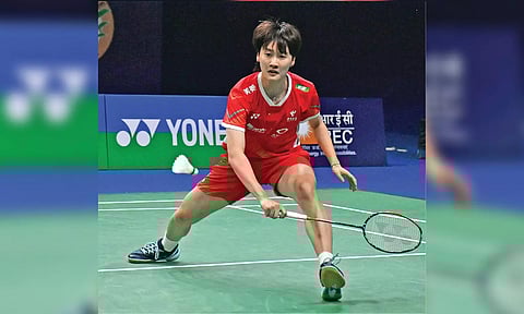 Chen Yu Fei returns a serve during the semi-final against Wang Zhi Yi