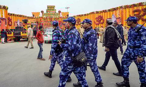 Security personnel on a road ahead of the Ram temple consecration ceremony in Ayodhya on Sunday, (PTI)
