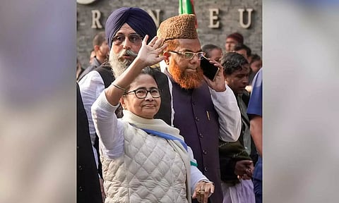 West Bengal CM and TMC supremo Mamata Banerjee accompanied by religious leaders participates in a 'sanghati' rally (all-faith harmony procession) in Kolkata on Monday (PTI)