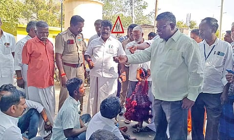 Agitation by locals against the grama sabha meet at Velakalnatham in Tirupattur district