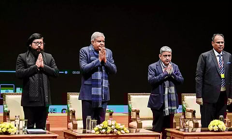 &nbsp;Vice President Jagdeep Dhankhar with MoS Sports Nisith Pramanik and the volunteers of National Service Scheme (NSS) who participated in the Republic Day Parade 2024 at Balayogi Auditorium in New Delhi on Saturday. (PTI)