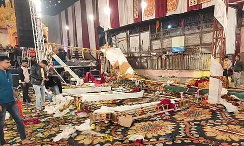 A collapsed stage at Kalkaji temple in New Delhi ON Saturday night. (PTI)