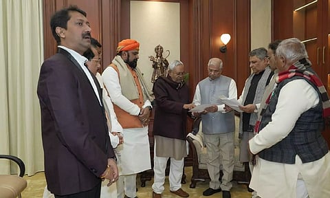 Acting CM Nitish Kumar,  leaders of JD(U), BJP, HAM, and an Independent MLA meet Governor Rajendra Arlekar. (ANI)