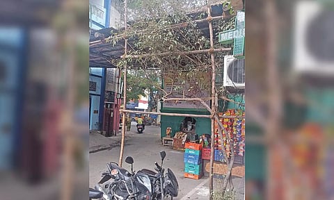 A temple is currently under construction at an intersection in Mylapore
