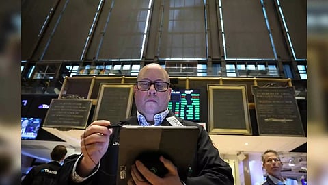 Traders work on the floor at the New York Stock Exchange (NYSE) in New York City, U.S (Reuters)