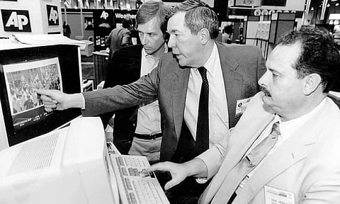 Hal Buell (centre) with his colleagues