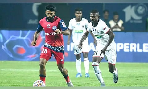 Jamshedpur FC and NorthEast United FC in action