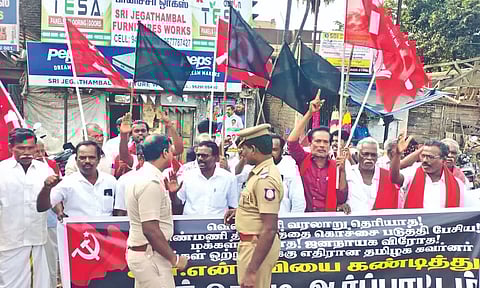 CPM workers raise slogans against Governor RN Ravi