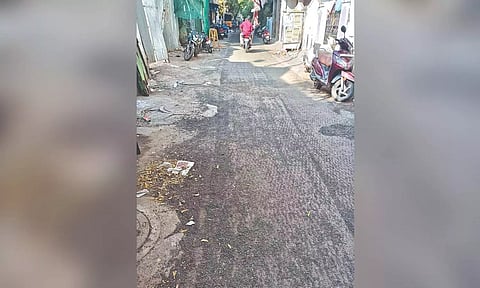 A partially milled road in Old Washermanpet