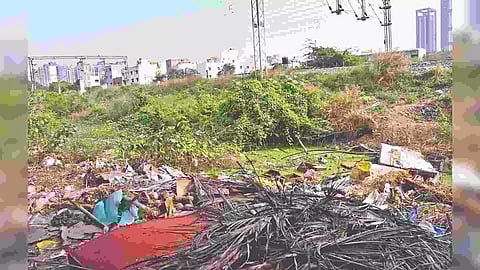 Garbage thrown into water channel along the tracks near Perambur railway station