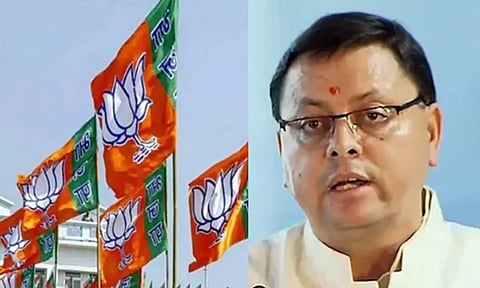 Pushkar Singh Dhami (right)