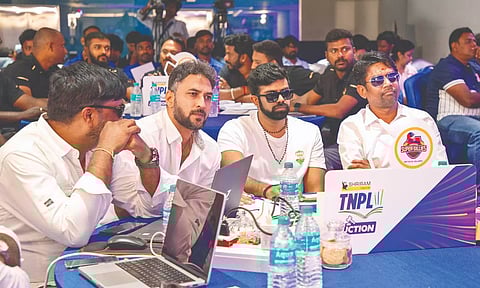 Chepauk Super Gillies owner B Sivanthi Adityan (C) at the auction