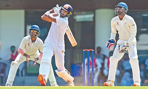 Karnataka’s batter Devdutt Padikkal plays a shot on the first day of the Ranji Trophy match against TN.