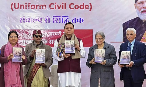 Uttarakhand CM Pushkar Singh Dhami with retired SC judge Ranjana Prakash Desai and others at Chief Sevak Sadan in Dehradun. (PTI)