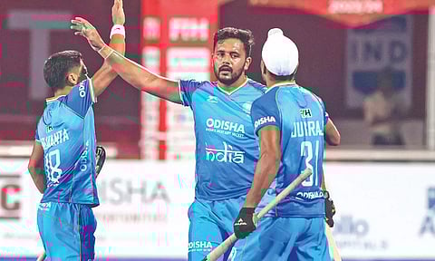Harmanpreet Singh celebrates after scoring a goal