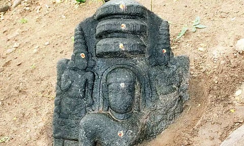 Tirthankara sculpture found half buried in soil near Tiruchuli
