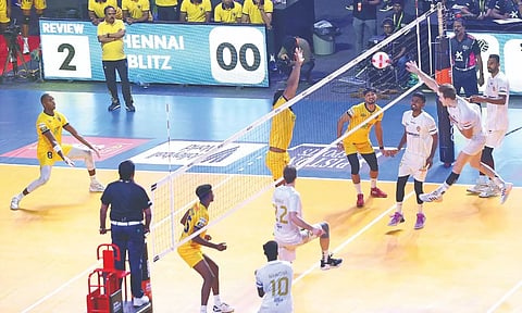 Max Senica returns a shot