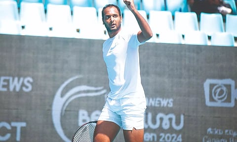 Ramkumar Ramanathan celebrates after winning against Luca Nardi and qualifying for the quarter-final