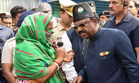 West Bengal Governor CV Ananda Bose interacts with a woman in Sandeshkhali (PTI)
