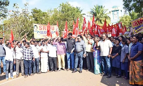 SRMU members staging protest in Tiruchy on Friday