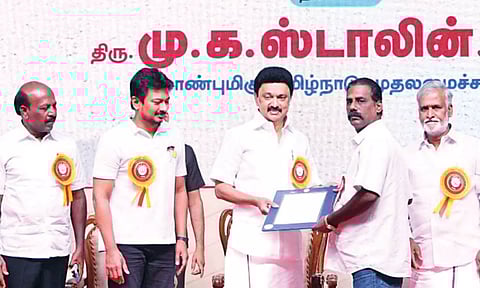 CM Stalin handing over letters to the beneficiaries in the presence of ministers in Chennai on Friday