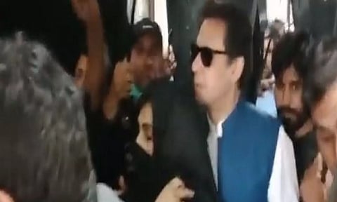 PTI founder Imran Khan with his wife Bushra Bibi
