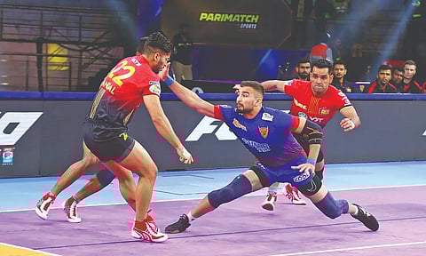 Dabang Delhi captain Ashu Malik goes for a raid against Bengaluru Bulls