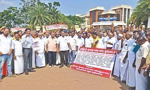 Rice mill owners, agents and workers staging a protest in Thanjavur on Tuesday