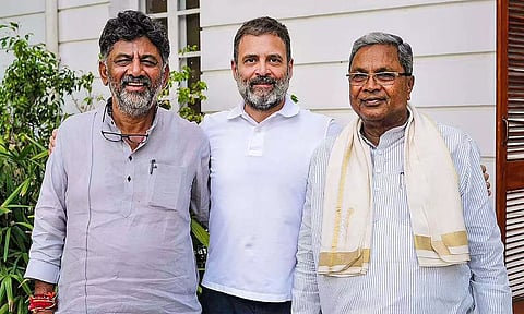 Congress leaders D K Shivakumar (L), Rahul Gandhi (C), and Siddaramaiah (R). (PTI)