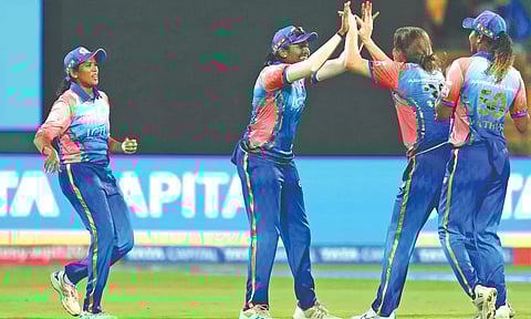 Mumbai Indians celebrates after taking the wicket of Meg Lanning