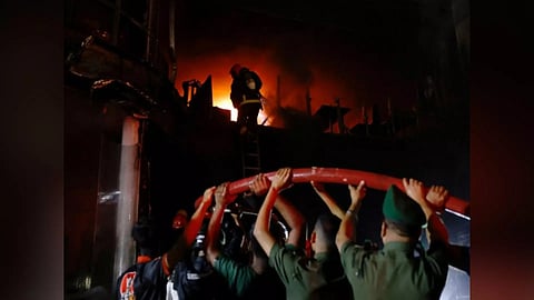 Fire broke out in a multi storey building in Dhaka (Reuters)