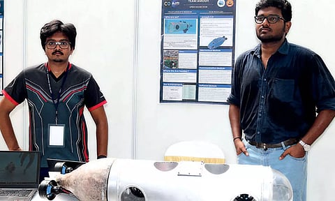 Students displaying an underwater autonomous submersible during the CFI Open House event at IIT-M