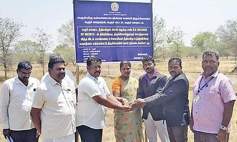 HR&amp;CE officials after putting up notice board on recovered temple land