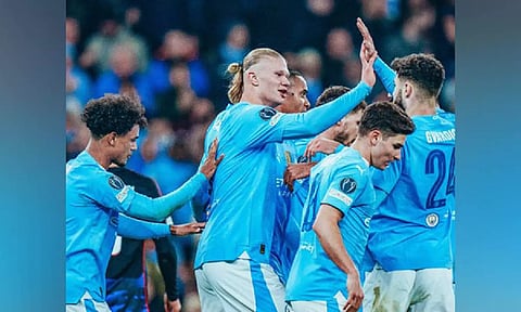 Erling Haaland celebrating with City