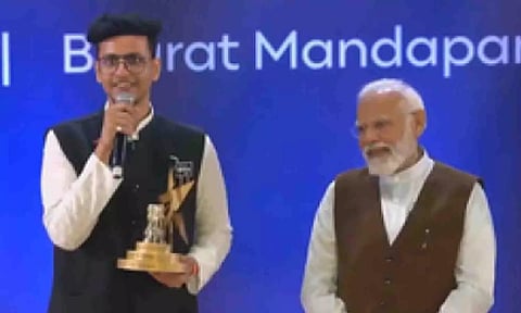 Nishchay Malhan, Prime Minister Narendra Modi (IANS)