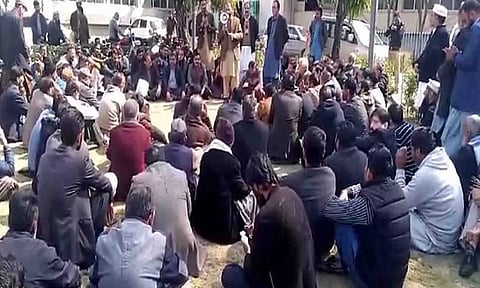 Secretariat employees association holds rally in Muzaffarabad (ANI)