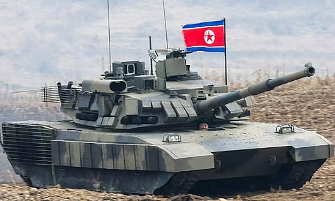 North Korean leader Kim Jong Un sits inside a tank during a military demonstration involving tank units, in North Korea (Reuters)