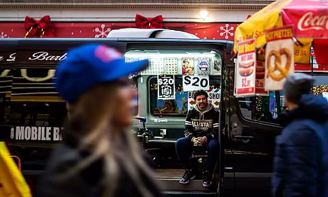 US retail sales rebound in February; weekly jobless claims fall