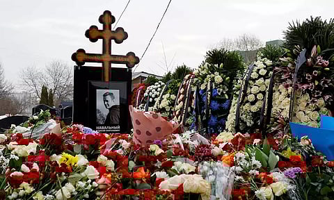 Flowers cover the grave of Russian opposition politician Alexei Navalny following his funeral at the Borisovskoye cemetery