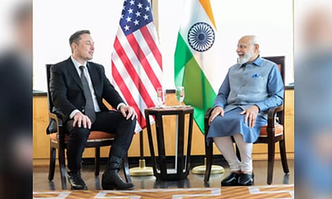 Elon Musk, PM Narendra Modi (IANS)