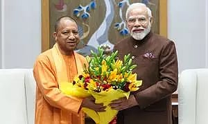 Yogi Adityanath with PM Modi