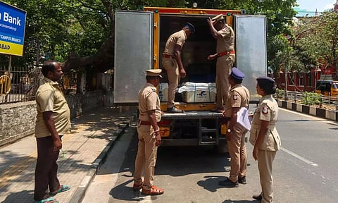 Flying squad members checking a vehicle to prevent misuse of money power and bribing of voters in Chennai on Sunday (Photo: Hemanathan M)