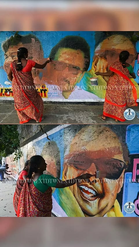 Ahead of the upcoming elections, Corporation workers paint the walls with the portraits of Political leaders in Chennai