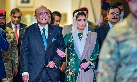 Pakistan President Asif Ali Zardari with daughter Asifa Bhutto arrive for a ceremony. (PTI)
