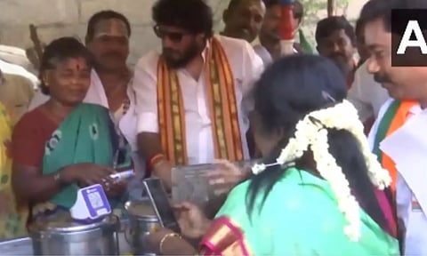 On campaign trail Tamilisai banks on development, pays street vendor digitally for 'Vada' (ANI)