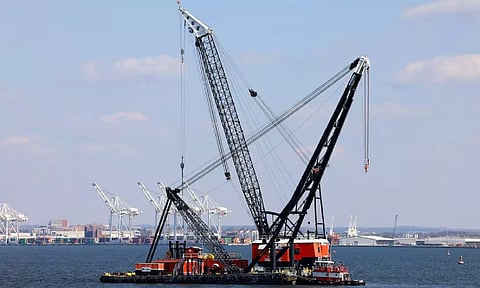 &nbsp;Large cranes in the Patapsco River near the collapsed Francis Scott Key Bridge in Baltimore (Reuters)