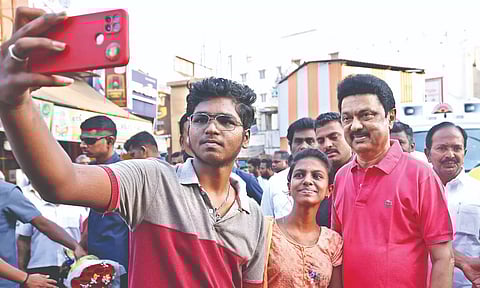 CM Stalin poses for a selfie in Salem on Saturday