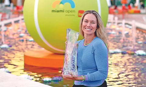 Danielle Collins poses with the trophy after winning the final
