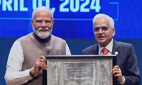 Prime Minister Narendra Modi; RBI Governor Shaktikanta Das (IANS)